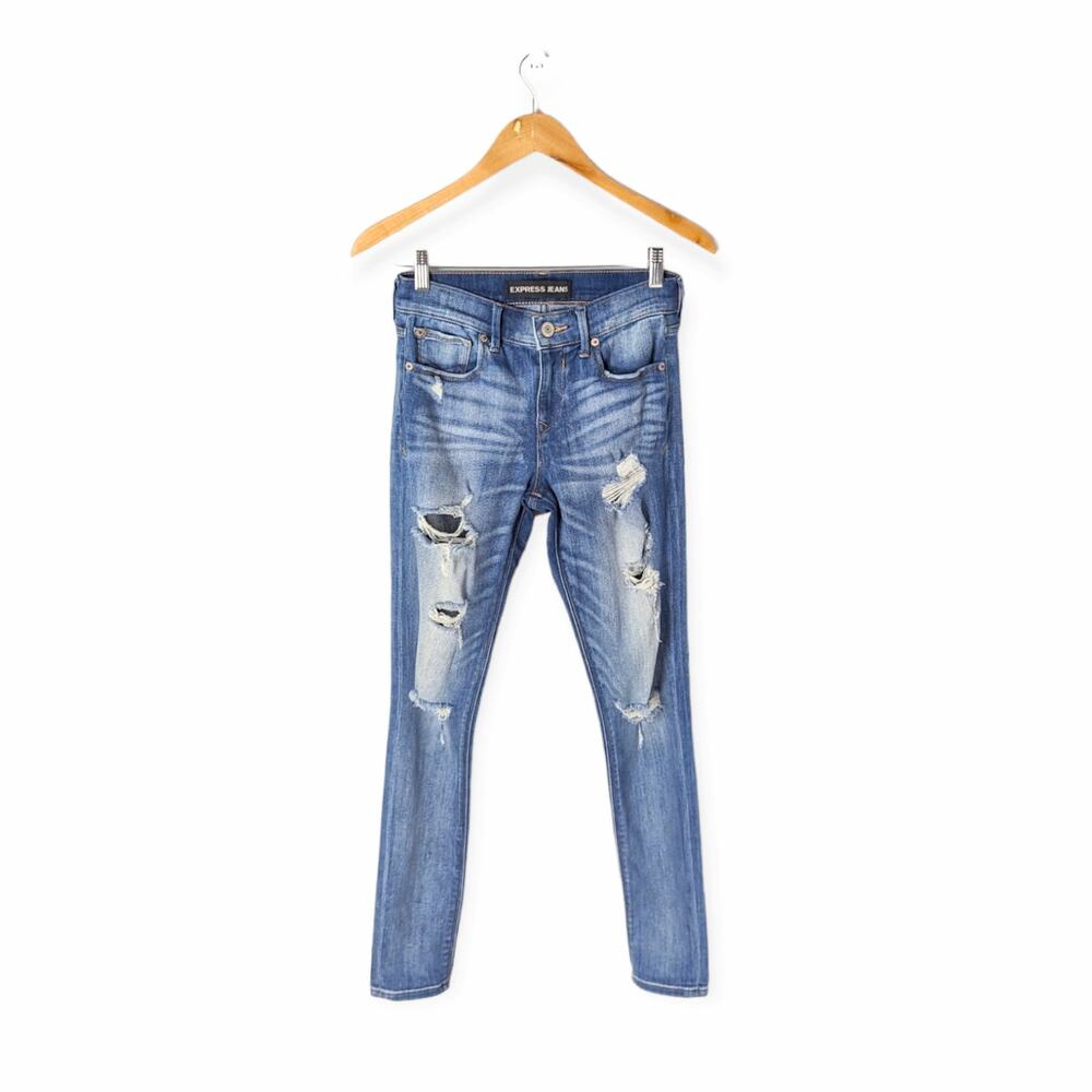 Express Jeans Women's Legging Medium Wash Blue Mid Rise Distressed Jeans Size 0R